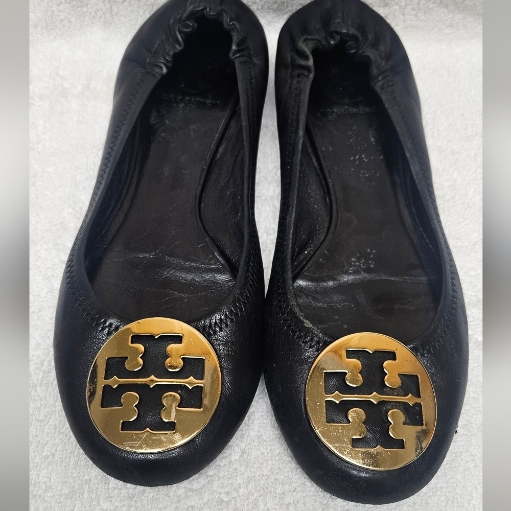 Tory Burch Black Flats with Gold Emblem